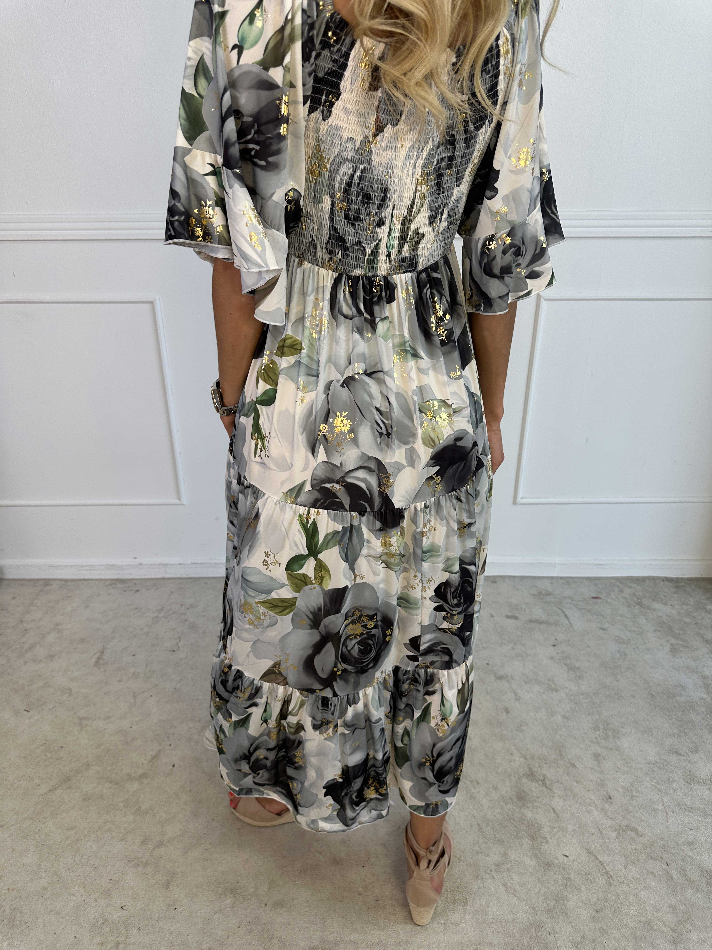 Elna Flower - Blomstret elastisk kjole med smock over brystet